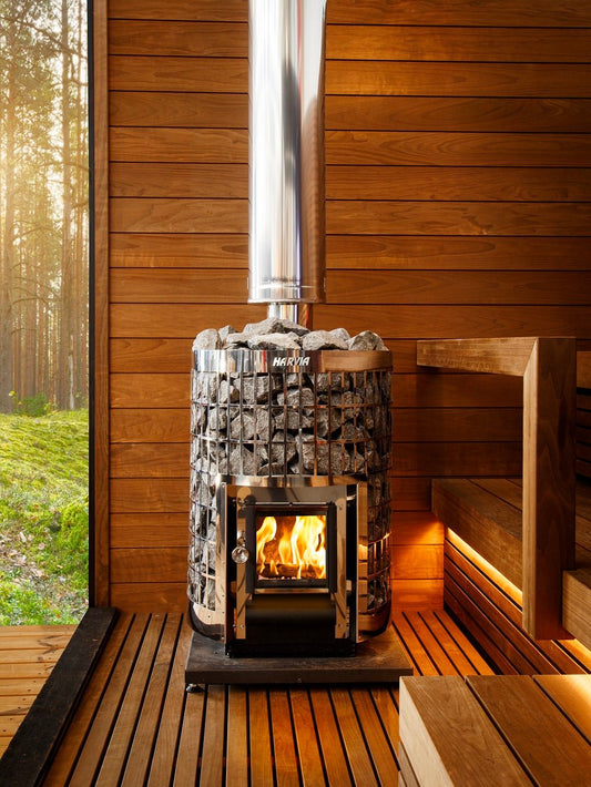 Harvia Cilindro Aço Aquecedor a Lenha em ação.