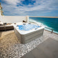 Jacuzzi Hydra 200 em um terraço com vista para o oceano.