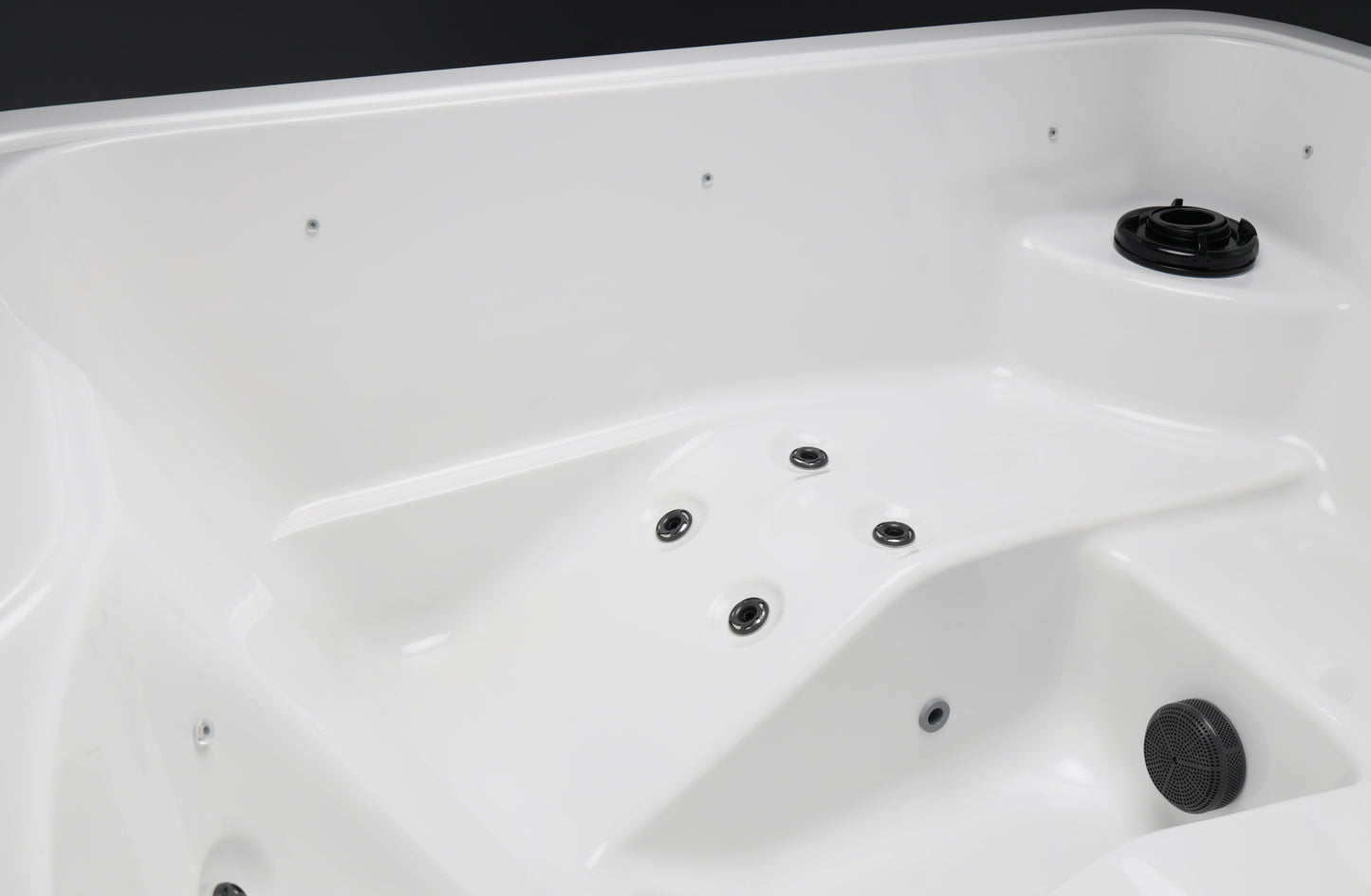 Jacuzzi Exterior Vellamo S em close-up mostrando detalhes da banheira.