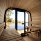 Sauna Exterior Cube 220 com design moderno e vista para o lago.