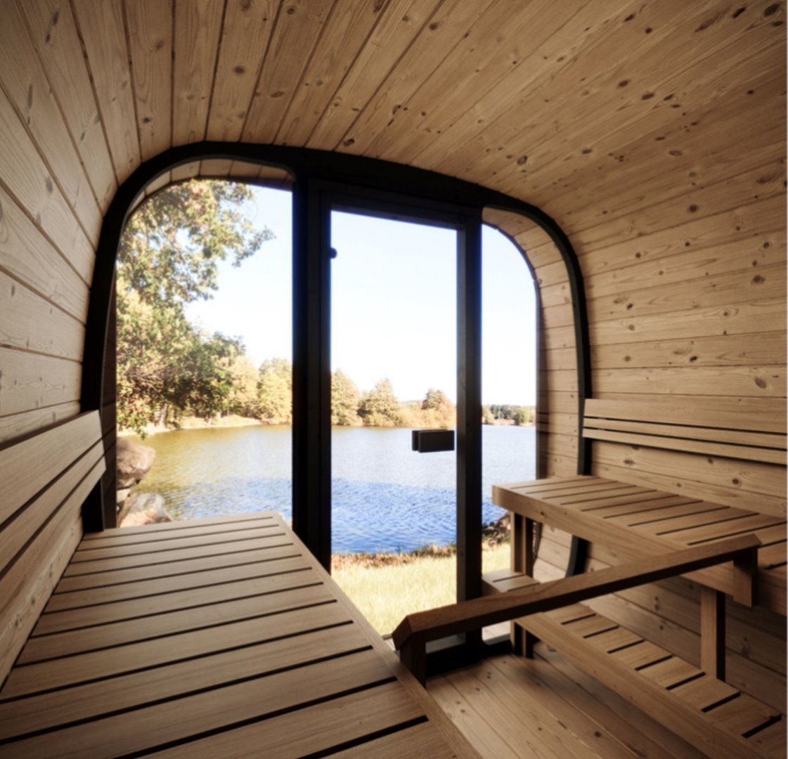 Sauna Exterior Cube 220 com design moderno e vista para o lago.