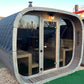 Sauna Exterior Cubus com porta de vidro e design moderno.