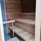 Sauna Exterior Cubus com bancos de madeira em ambiente interno.