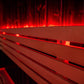 Sauna Fenix com iluminação LED em banco de madeira.