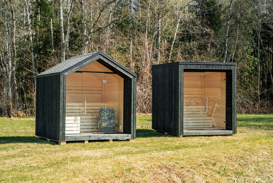 Sauna Exterior Lumi com design nórdico minimalista e porta de vidro.
